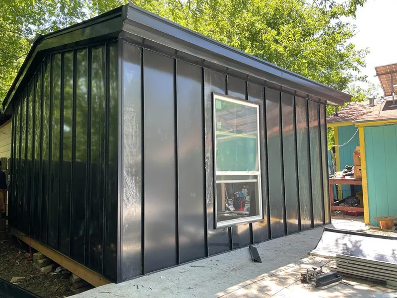 Black standing seam metal wall panels for Metal Roof Installation in East Manchester